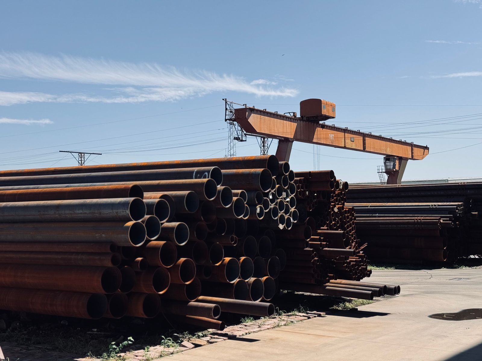 Steel pipe stacked in a fabrication yard
